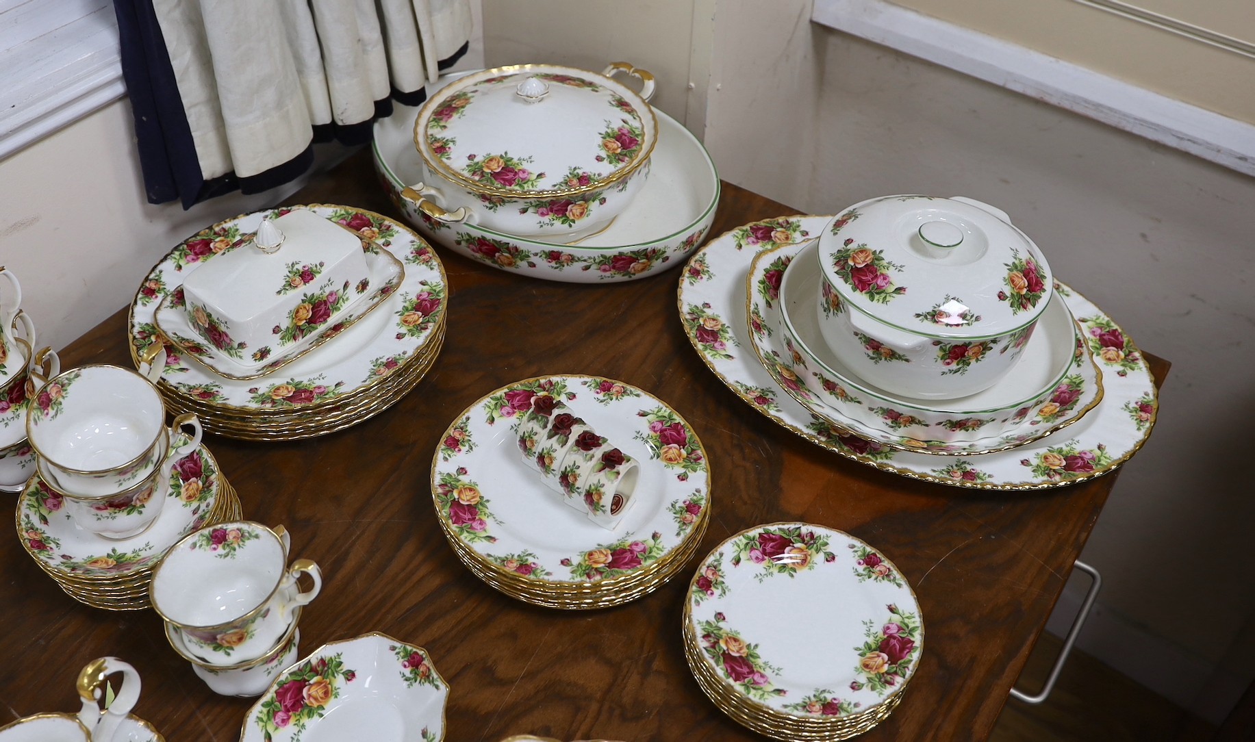 Royal Albert Old Country Rose dinner and tea service, to include a large biscuit box three tier cake stand etc